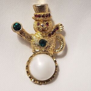 Snowman Brooch Gold with Ruby and Emerald stones.